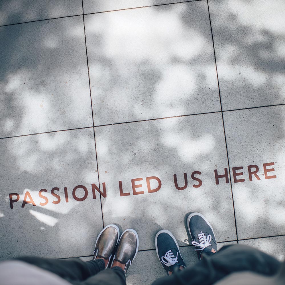 Passion led us here pavement writing with shoes