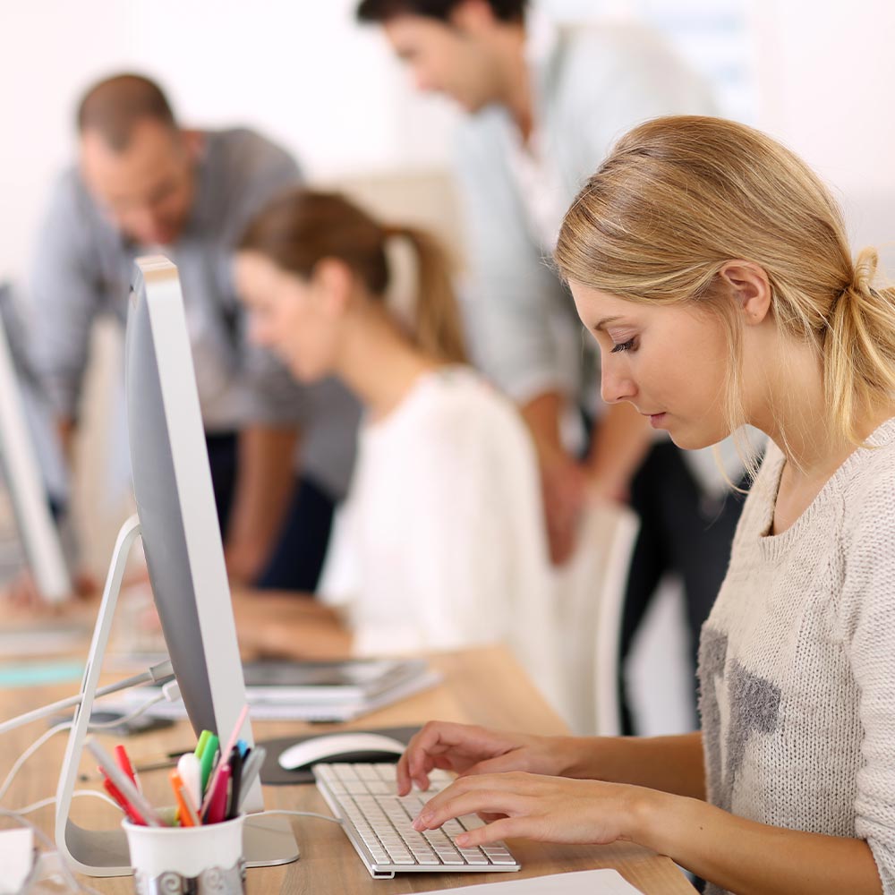 Woman working on computer in office
