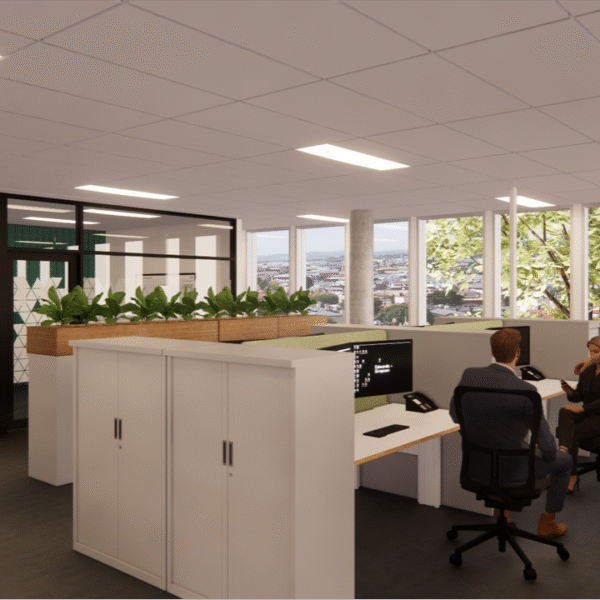 Image of an internal office with people talking around a desk.
